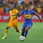 Joseph Molangoane challenges Lyle Lakay for the ball