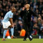Manchester City manager Pep Guardiola speaks to the match referee (not in picture) at half-time.