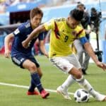 Radamel Falcao of Colombia and Genki Haraguchi of Japan.