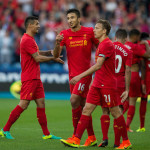 Liverpool cruise past Huddersfield Town