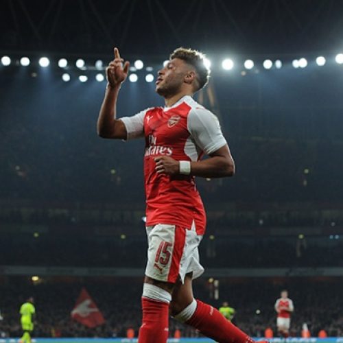 Ox double sends Arsenal through