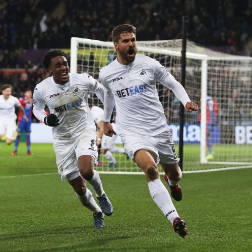 Swans win 9-goal thriller