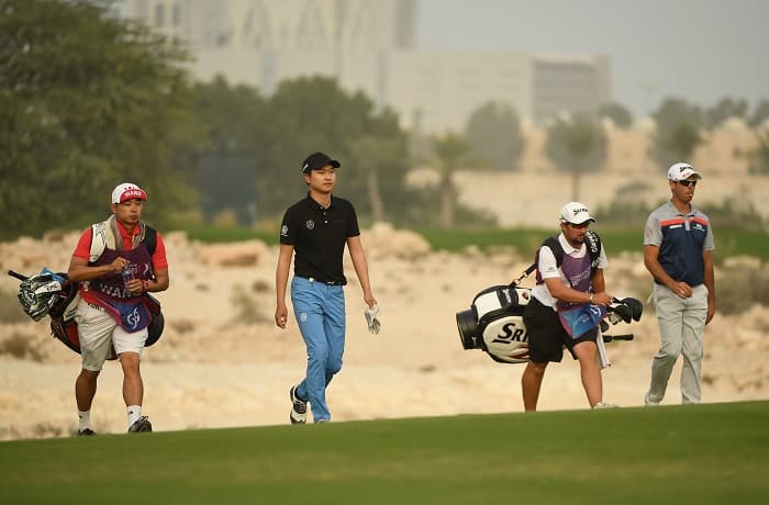 Wang holds off Van Zyl in Qatar