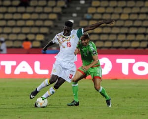 Read more about the article Algeria out after Senegal draw, Tunisia put four past Zim