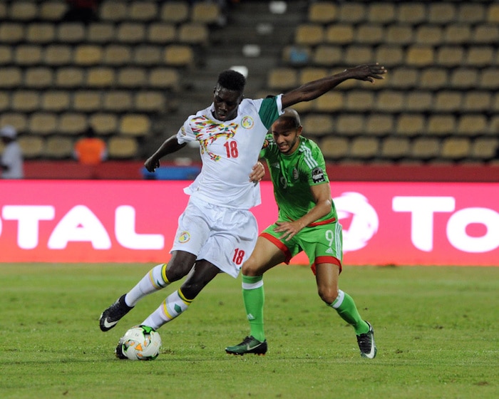 You are currently viewing Algeria out after Senegal draw, Tunisia put four past Zim