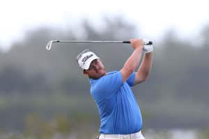 Read more about the article Coetzee shoots 66, Tiger 77