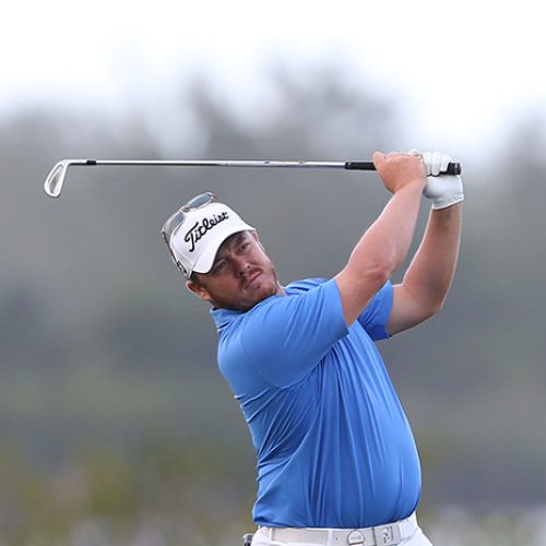 Coetzee shoots 66, Tiger 77