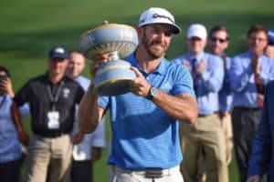 Read more about the article Johnson wins WGC thriller, completes slam