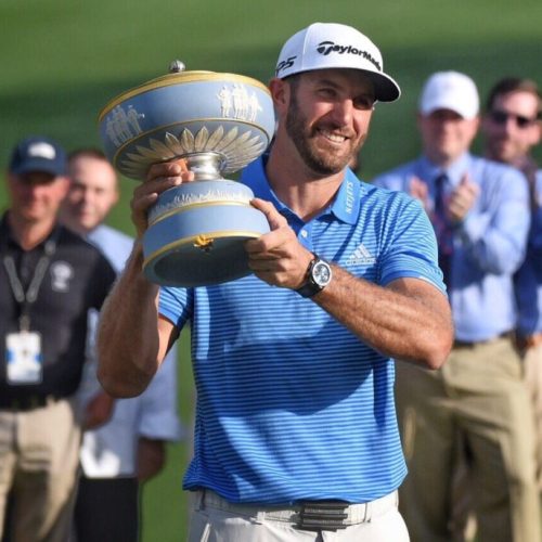 Johnson wins WGC thriller, completes slam