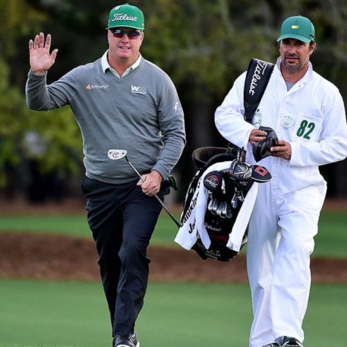 Hoffman tames wind, leads The Masters