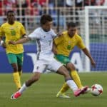 Ritsu Doan vies for the ball with Grant Margeman