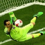 Claudio Bravo of Chile saves Portugal's penalty