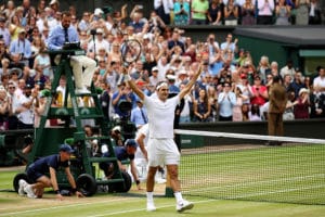 Read more about the article Federer creates history with one-sided victory
