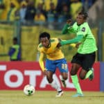 Percy Tau challenged by Bopunga Botuli