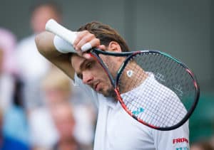 Read more about the article Wawrinka loses in early Wimbledon shock