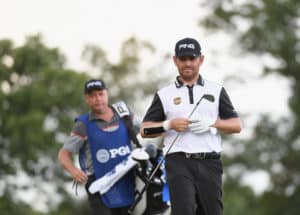 Read more about the article Oosthuizen survives scare, two off the lead