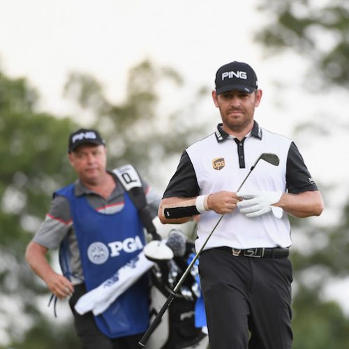 Oosthuizen survives scare, two off the lead