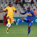 Bhongolwethu Jayiya battles for the ball with Vincent Kobola