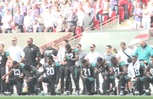 Read more about the article Watch: NFL players protest at Wembley