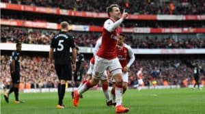 Read more about the article Arsenal fight back to down Swansea