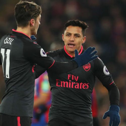 Sanchez double seals win for record-equalling Wenger