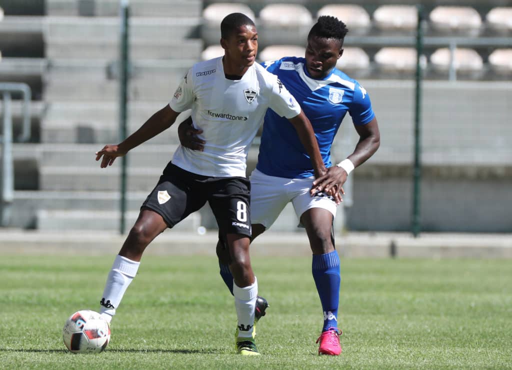 Jamie Webber evades a challenge from Khomotso Masia