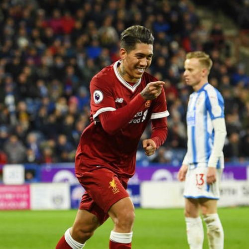 Liverpool thump Huddersfield