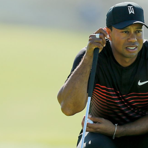 Woods fights back to finish on par