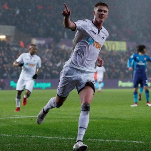 Swansea sink Arsenal