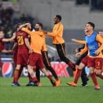 Roma's players celebrate after knocking out Barcelona.