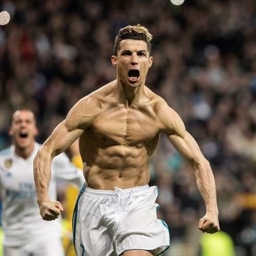 Late Ronaldo penalty sends Madrid into semi-finals