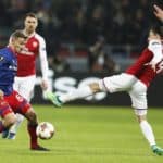 Fedor Chalov of CSKA Moscow in action against Hector Bellerin of Arsenal.
