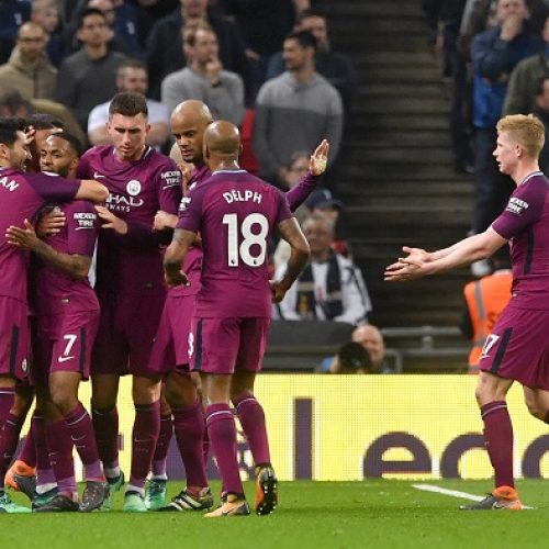 City beat Spurs to edge towards the title