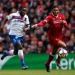 Stoke City's Mame Biram Diouf and Liverpool's Joe Gomez battle for the ball