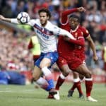 Stoke City's Ramadan Sobhi and Liverpool's Georginio Wijnaldum battle for the ball during the Premier League match at Anfield.