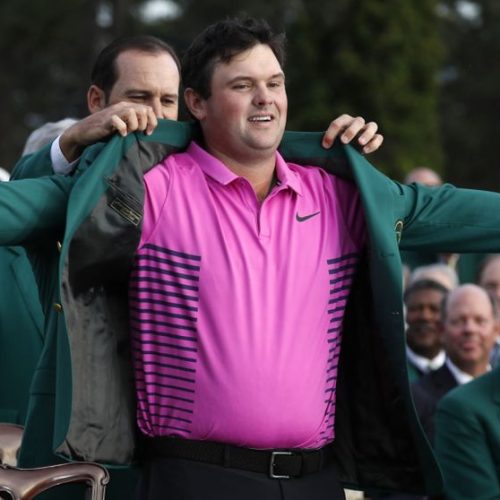 Reed battles hard to win The Masters