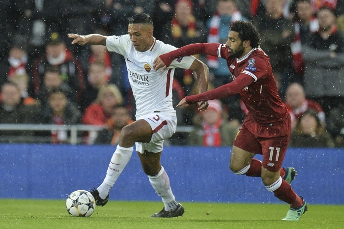 Roma's Juan Jesus and Liverpool's Mohamed Salah in action