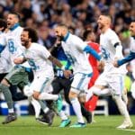 Real Madrid players celebrate at the end of the semi-final.