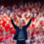 Arsenal manager Arsene Wenger salues the fans.