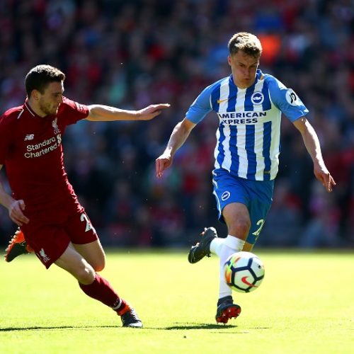 Liverpool thump Brighton to secure UCL spot