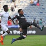 Happy Jele of Orlando Pirates challenges Siphelele Mthembu of Free State Stars.