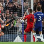 Jonas Lossl is beaten by Marcos Alonso's inadvertent header