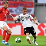 Austria's Peter Zulj in action against Joshua Kimmich of Germany.