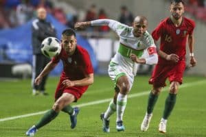 Read more about the article Guedes double guides Portugal past Algeria