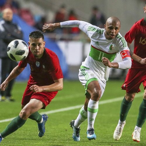 Guedes double guides Portugal past Algeria
