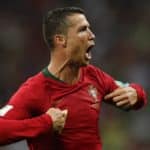 Cristiano Ronaldo of Portugal celebrates after scoring his third goal in the World Cup game against Spain.