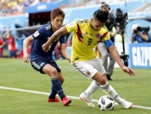 Read more about the article Japan beat ten-men Colombia