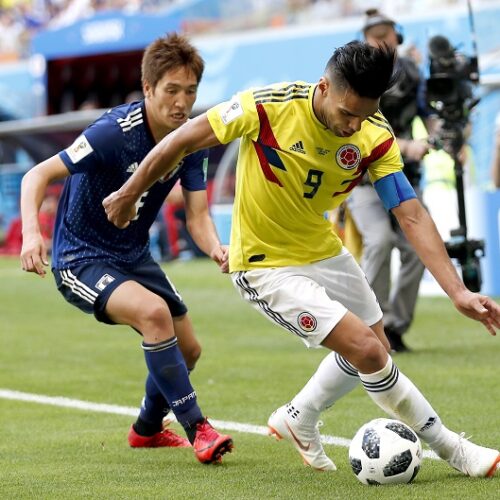 Japan beat ten-men Colombia