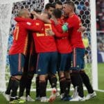 Players of Spain celebrate against Morocco.