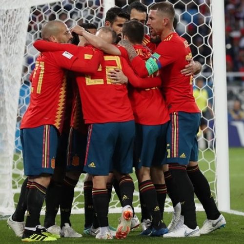 Spain, Portugal survive scares to progress